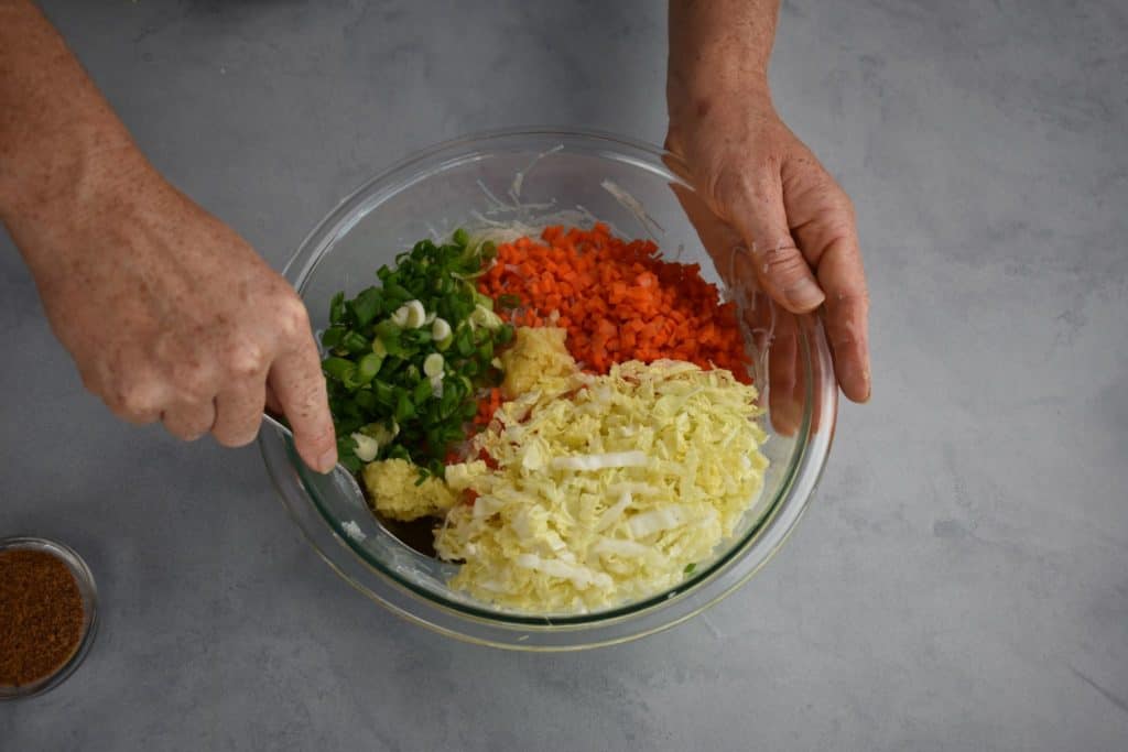 chopped vegetables for the stuffed chicken in a bowl.