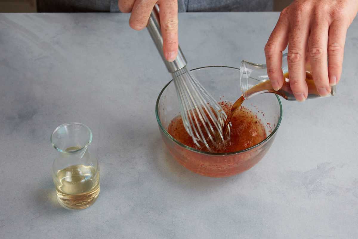 ingredients for dipping sauce being whisked together.