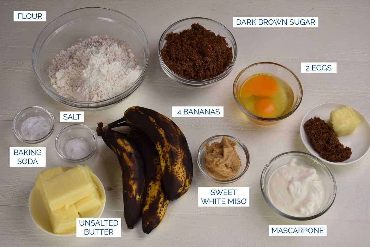 ingredients for miso banana bread: flour, sugar, banana, eggs, butter, mascarpone, baking soda, miso and salt