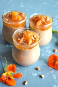 three glass jars with millet rice pudding