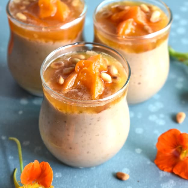 three glass jars with millet rice pudding