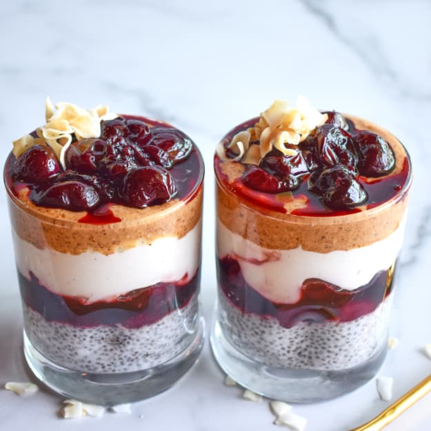 two pudding cups, coconut and cherry flavor