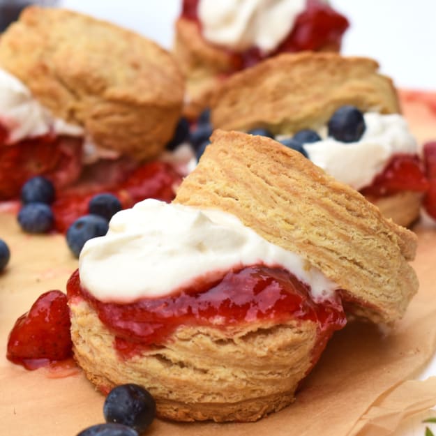 close up of maple biscuits with strawberry and cream filling