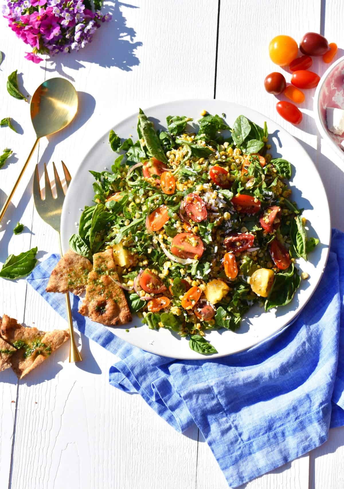 Grilled Corn, Tomato, Red Onion, Arugula, and Ricotta Salata Salad with Basil Vinaigrette