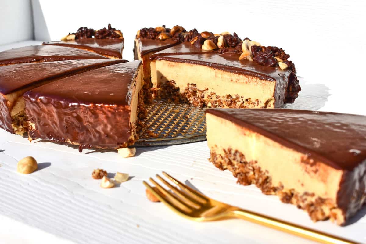 chocolate hazelnut mousse cake sliced with a fork beside