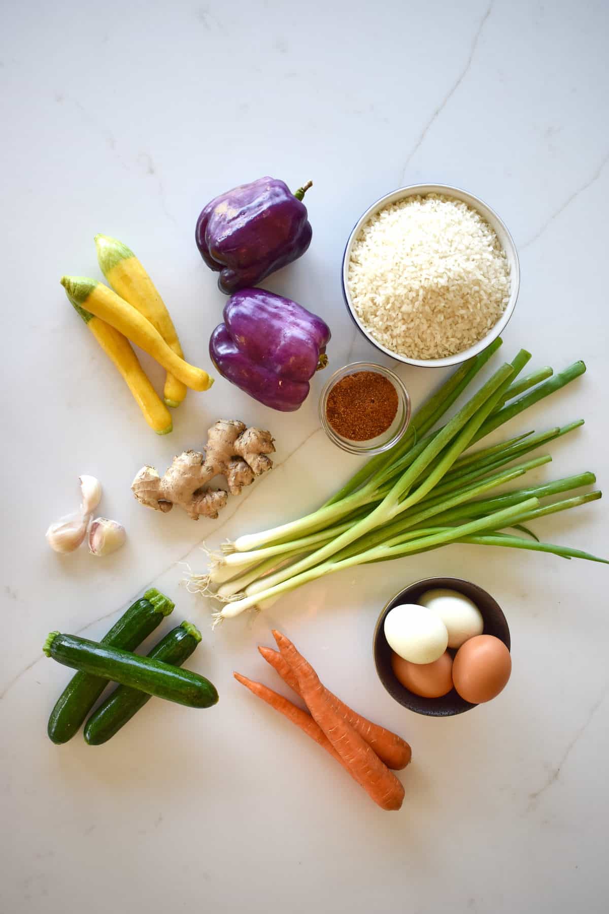 vegetables: green onions, rice, peppers, ginger, zucchini, carrots and eggs