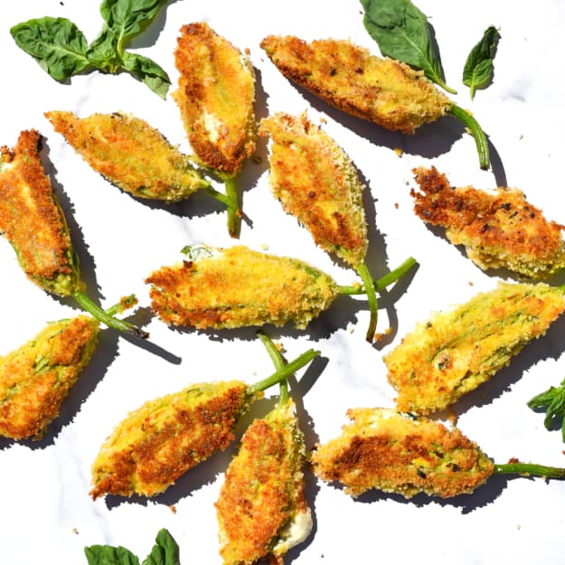 overhead shot of breadcrumb covered stuffed squash blossoms