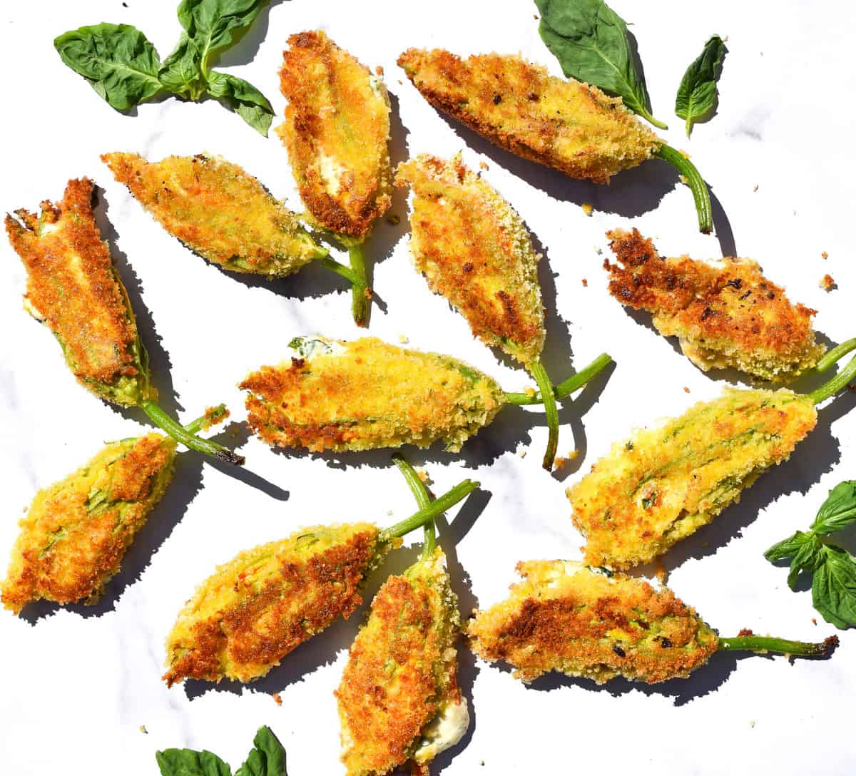 overhead shot of breadcrumb covered stuffed squash blossoms