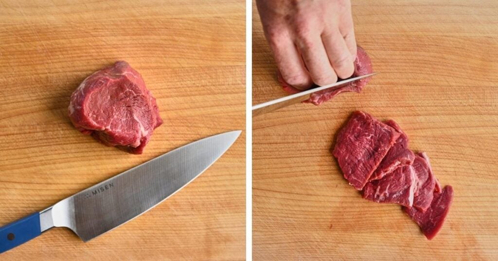 tenderloin steak with a sharp knife and a knife chopping the steak into slices.