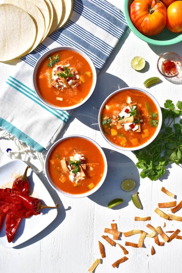 overhead shot of bowls of chicken tortilla soup