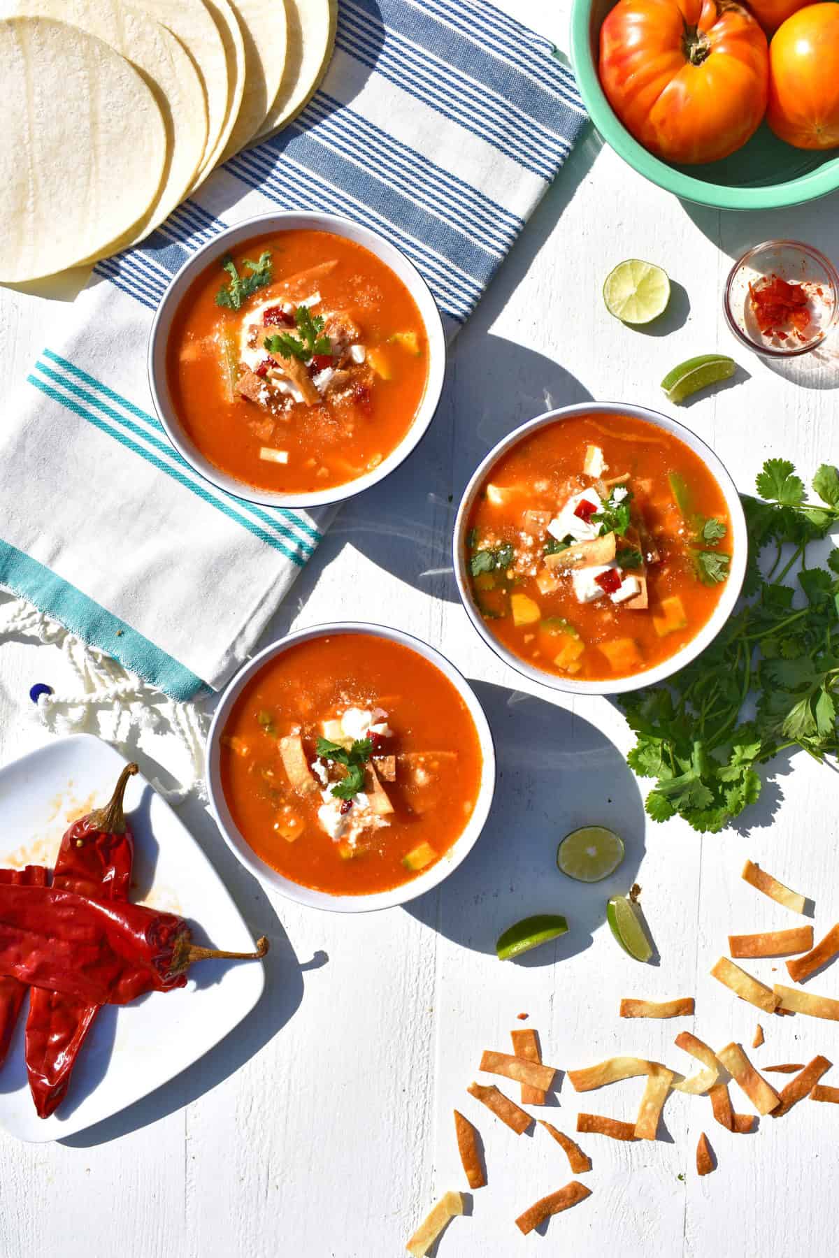 overhead shot of bowls of chicken tortilla soup