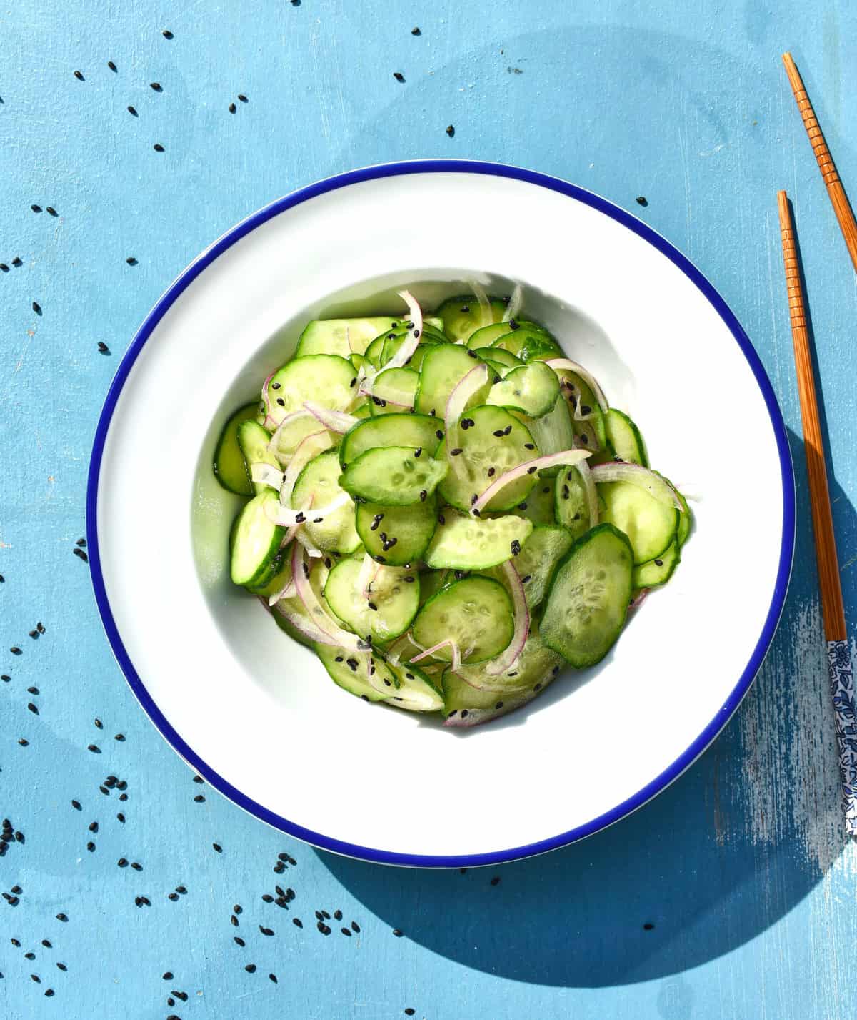 overhead shot of a bowl of sesame cucumber salad