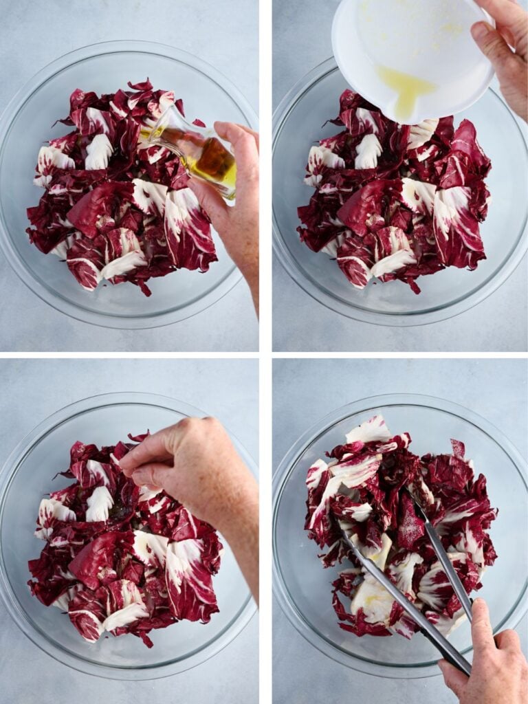Torn radicchio in a glass bowl being seasoned with olive oil, lemon juice, and salt.