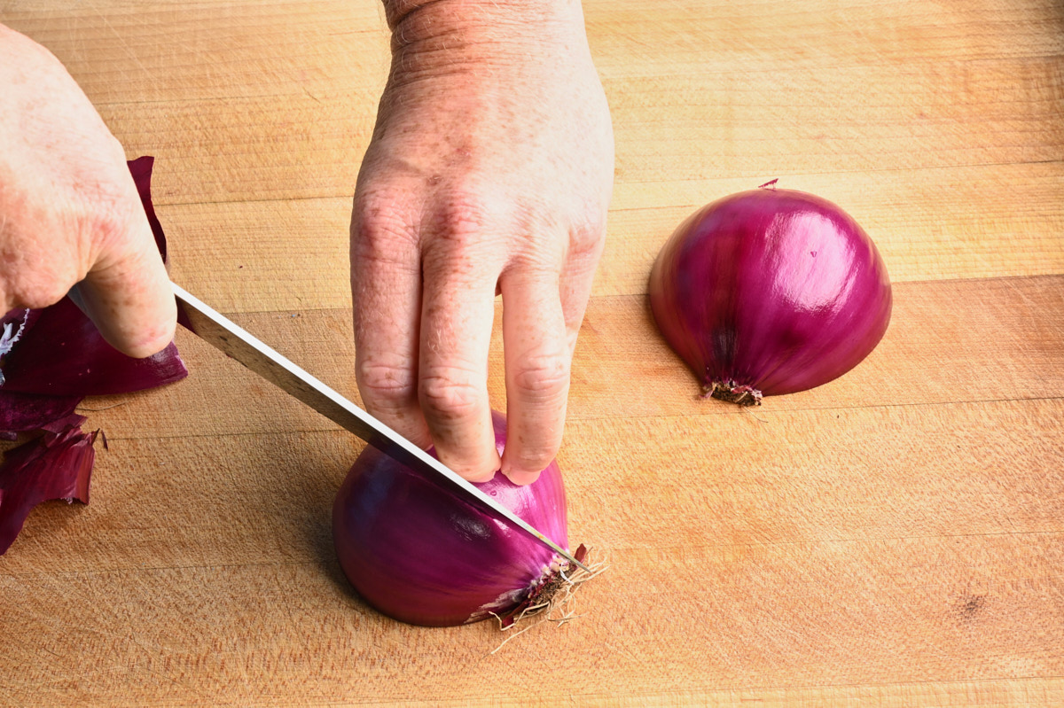 cutting a red onion