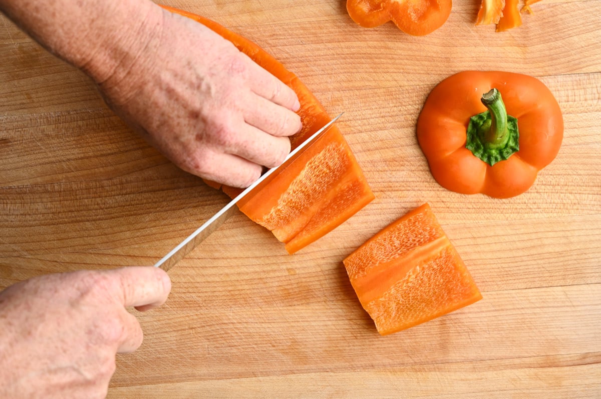 pepper being cut into thick strips