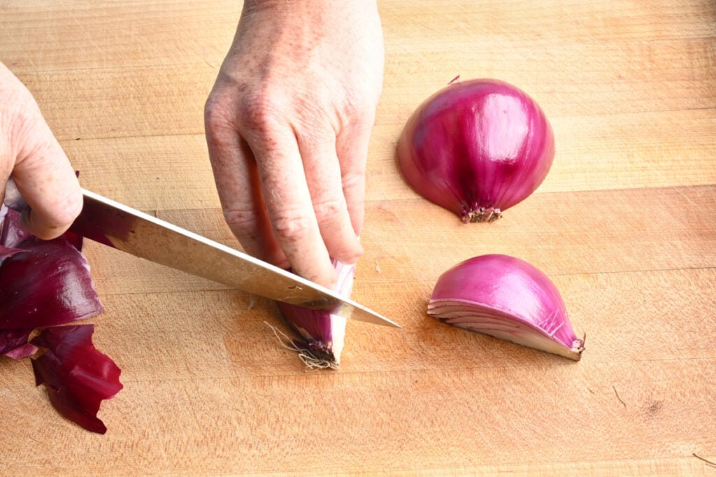 cutting a red onion