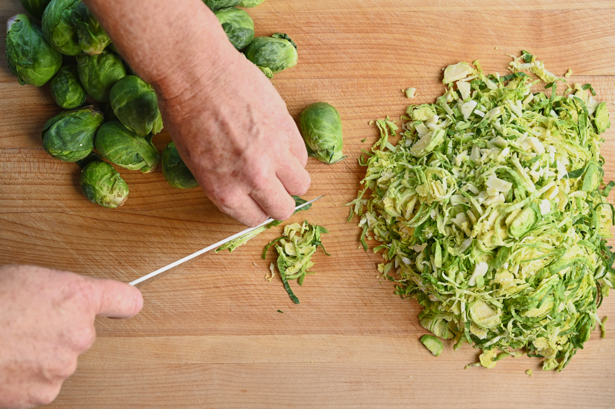 Slicing halved brussel sprouts