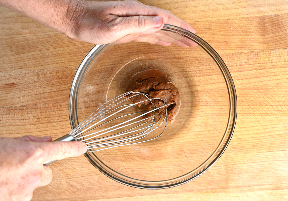 whisking miso paste and water