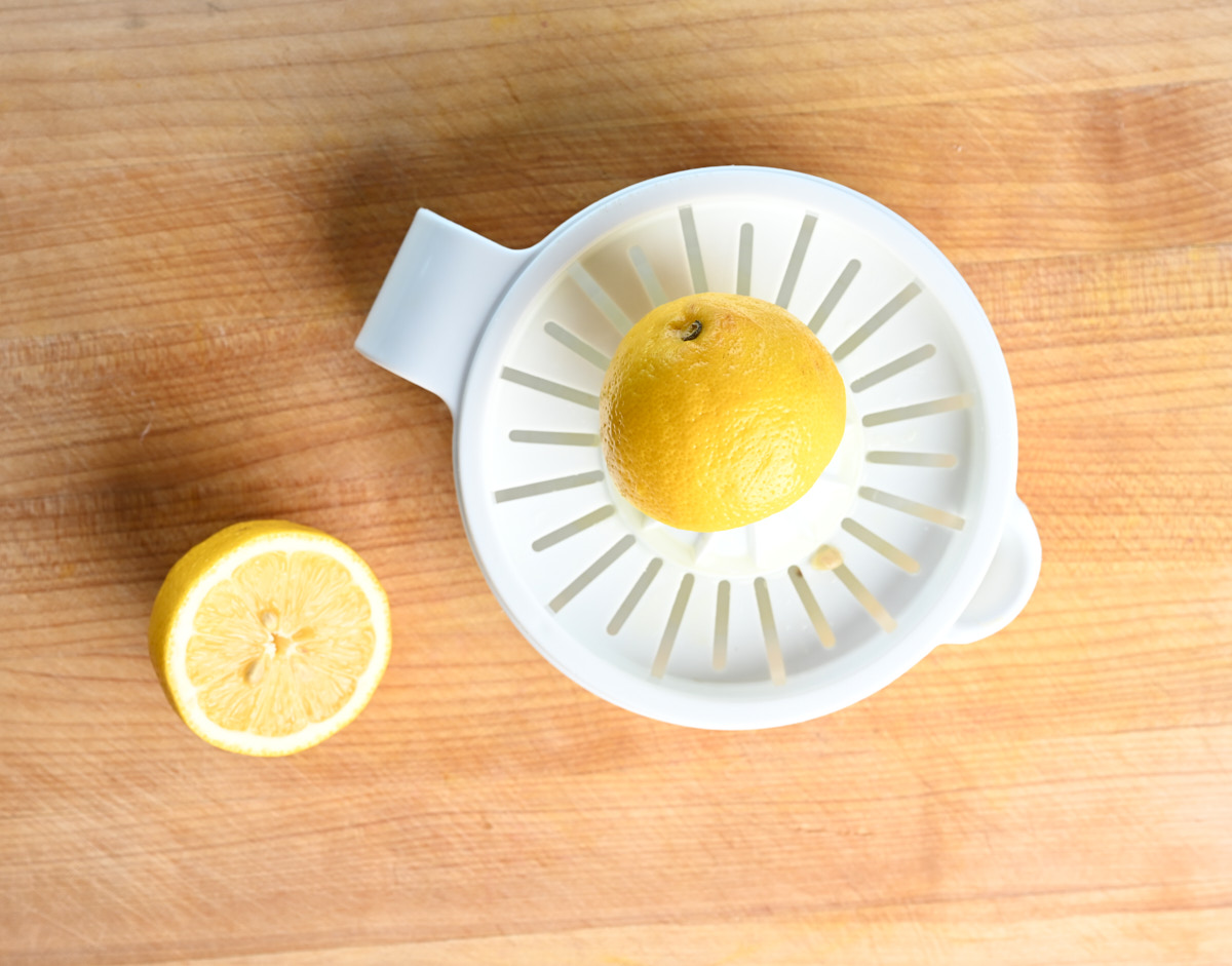 A lemon being juiced