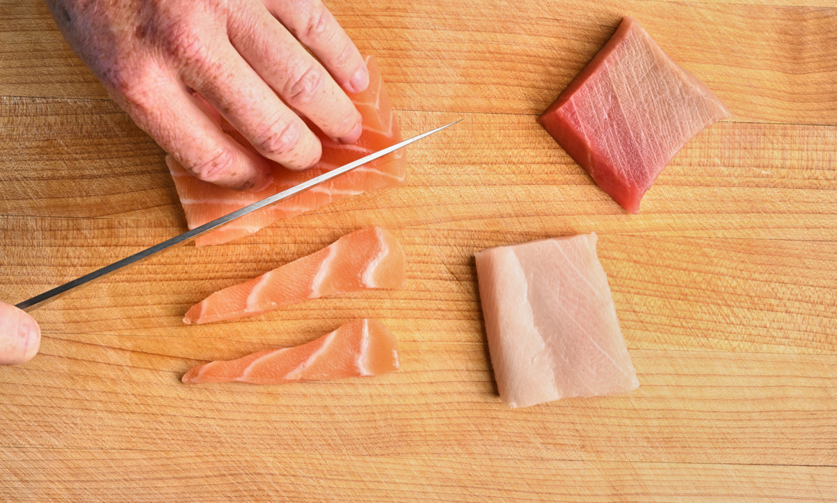 woman slicing Salmon