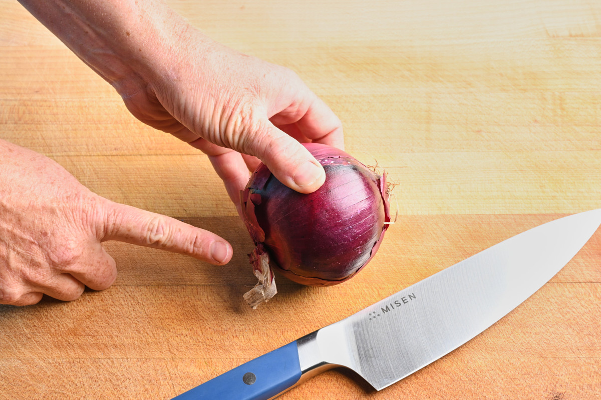 pointing to the root of the onion