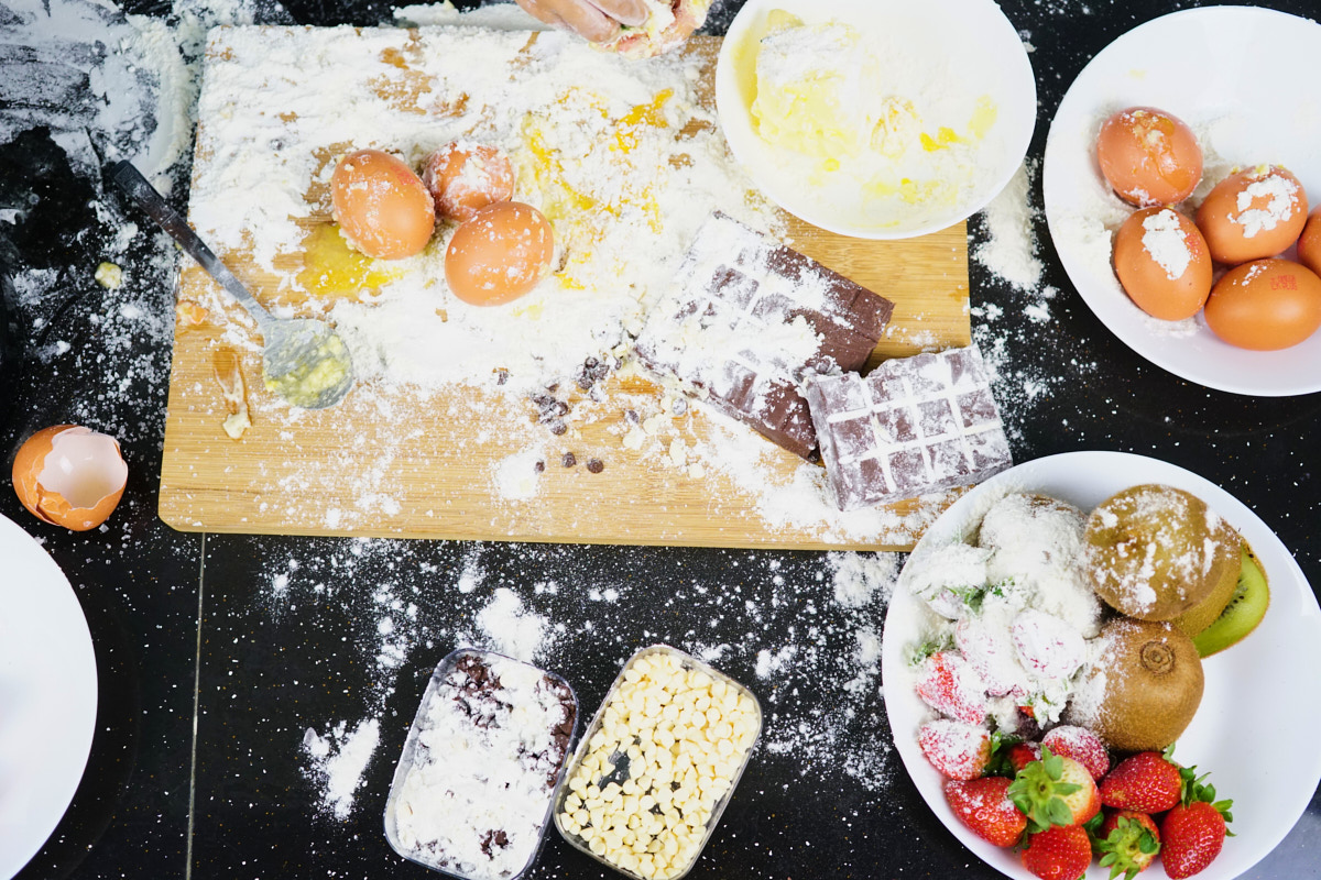 Messy cooking area with flour everywhere and the need to learn the clean as you go method.