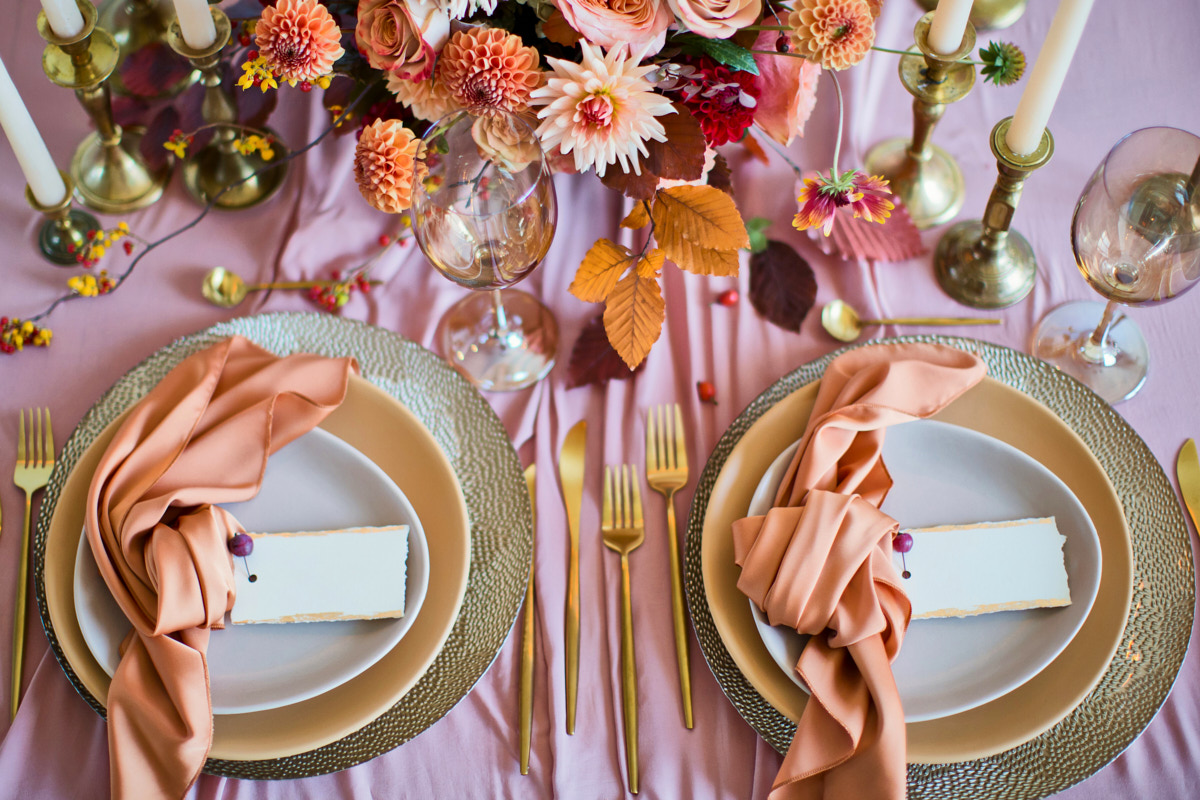 A beauiful table set and prepared for guests to arrive.