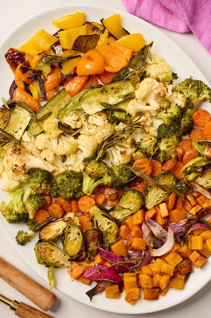 Roasted vegetables arranged on a platter, ready to serve