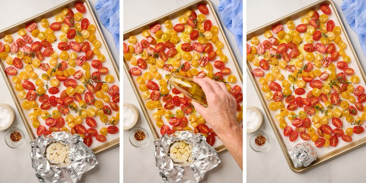 Cherry tomatoes arranged on a baking sheet with thyme sprigs and sliced garlic, drizzled with olive oil and seasoned