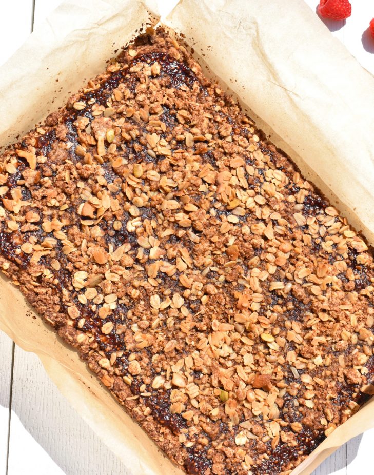 overhead shot of a tray of raspberry oatmeal bars